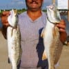 Joe Brian of Beaumont fished his mirro-lure to land this nice red and trout