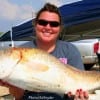 Lacey Bundy of Magnolia TX wrestled up this HUGE 38 inch Tagger Bull Red on a finger mullet