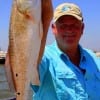 Liberty TX angler Phillip George took this nice 23 inch slot red on live shrimp