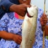 Miss Spikes of Sour Lake TX took this 22 inch slot red on live shrimp