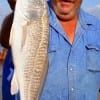 Randy West rigged up with finger mullet to catch this slot red