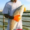 Soon to be a Guamanian- Isaiah McGill caught this 37 inch slot red to celebrate