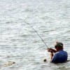 Wading the surf, Tom Olive of Gilchrist TX fished a topwater lure for this nice trout