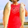 Brannon Barnaba of Baytown TX took these 28 and 22inch slot reds on mullet