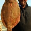 Donald Flemming of Katy TX nabbed this really nice 23 inch flounder while fishing a finger mullet