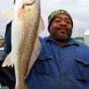 Emmit Fisher of Houston took this nice 28inch slot red on shrimp