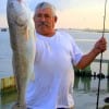 Jose Uriegas of Houston waded Rollover Bay with a finger mullet to catch this HUGE 36inch Tagger Bull Red