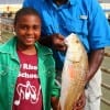 Lester Skinner of Houston teamed up with Brandon Johnson to catch this nice slot red on a finger mullet