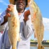 Paul Mayfield of Houston took these two slot reds on live shrimp