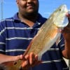 Thane Smith of Houston took this nice 24inch slot red on shrimp