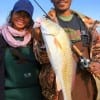 Wade-buddy Theresa Newman and Manny Arciniega of Houston waded Rollover Bay with live shrimp to catch this 27inch slot red