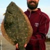 Berkley Gulp enticed this HUGE 24 inch Saddle Blanket Flounder to hit Spring TX angler Jordan Shuler's retrieve