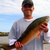 Chad Wildman of Channelview TX landed this nice 32 inch tagger Bull red on a finger mullet