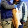 Humberto and Sherry Escobedo of Houston celebrated their 25th Wedding Anniversary by catching and releasing this HUGE 39 inch Bull Red at Rollover Pass