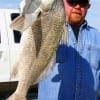 Jimmy Staples with his keeper eater drum he caught on shrimp