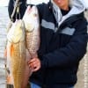 Koontze TX anglerette Sharn Barker took these two nice slot reds fishing finger mullet