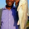 Roger Thomas of Houston took this nice 23 inch slot red on live shrimp