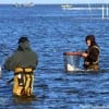 These two Bay waders hooked up and landed big flounder at the same time