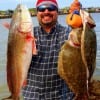 Tony Saldana of Houston took this 28 inch red and 22 plus 20 inch flounder on finger mullet