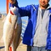 Aron Bernal of Galveston took these twin 25 inch slot reds on shrimp