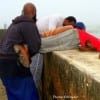 Hanging on to your fishin' bud trying handland your big fish