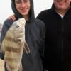 Father and son- Gary and Evan Pfeffer of Houston fished rollover today where Evan took this nice keeper drum on shrimp