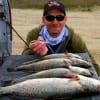 Kayaker Mike Nixon of Cut & Shoot TX caught 4 flounder (released) and 4 Specks (kept) while fishing the bay with trout killers