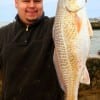 Victor Martinez of Katy TX caught this nice 24 inch slot red fishing shrimp