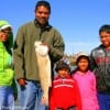 West Indies anglers The Mahadeo family of Humble TX show off their dads nice slot red he caught on shrimp