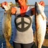 MA BARKER showing off her trout she caught on T-28s