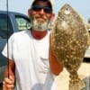 Alton Thorpe of Gilchrist landed this nice flatfish while fishing a finger mullet