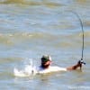 Landing a speck with a mouth full of hooks can be challenging and painful