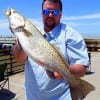 League City angler Mike Godfry fished a dead shrimp to entice this really nice 24.8inch- 6 lb speck