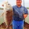 Louis Parker of Huntsville TX fished a live shad to fetch this nice keeper drum