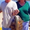 Lumberton TX angler Raydine and Bill Graves tethered up these reds and drum on shrimp