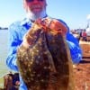 Shelby Camp of Thickett TX fished finger mullet for these nice flounder