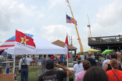 As TAPS was played on the bugle, all eyes and hearts were turned to the huge American Flag.