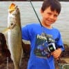 Hunter Heath of League City TX hefts this really nice 26.5 inch - 6.5 lb gator-speck caught on a T-28 MirrOlure