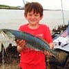 League City TX angler 9yr old Jacob Godfrey hefts this really nice speck caught on Berkley Gulp