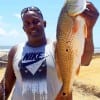 Pearland TX angler Johnny Lowery fished live shrimp to nab this nice slot red