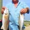 Scott Hardy of Pineland nabbed this nice red and trout while fishing finger mullet