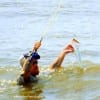 T-28 in the surf adds up to a speckled sea trout for supper
