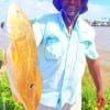 Chicken Boy Krewe prez Derick Hayes of Houston took this nice 26inch slot red on a finger mullet