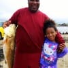Dad and Daughter - Allie Brooks and 7 yr old Bella of Houston teamed up to catch this 26inch slot red