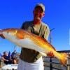 Dan Hudson of Crosby TX fished a finger mullet to nab this HUGE 42inch tagger bull red