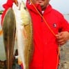 Edgar Rodriguez of Houston nabbed these nice slot reds on finger mullet