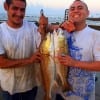Fishin buds Jesse Elizondo and Mark Garza of Houston took these slot reds on finger mullet