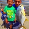 Former Marine Jose Alvarado of Atascosita TX with 4yr old Joshua teamed up to catch this nice pompano on shrimp