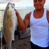 Joe Bustos of Edna TX caught and released this 30inch bull red he took on shrimp