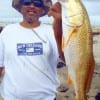 Karl Dever of Houston fished a finger mullet to land this nice slot red